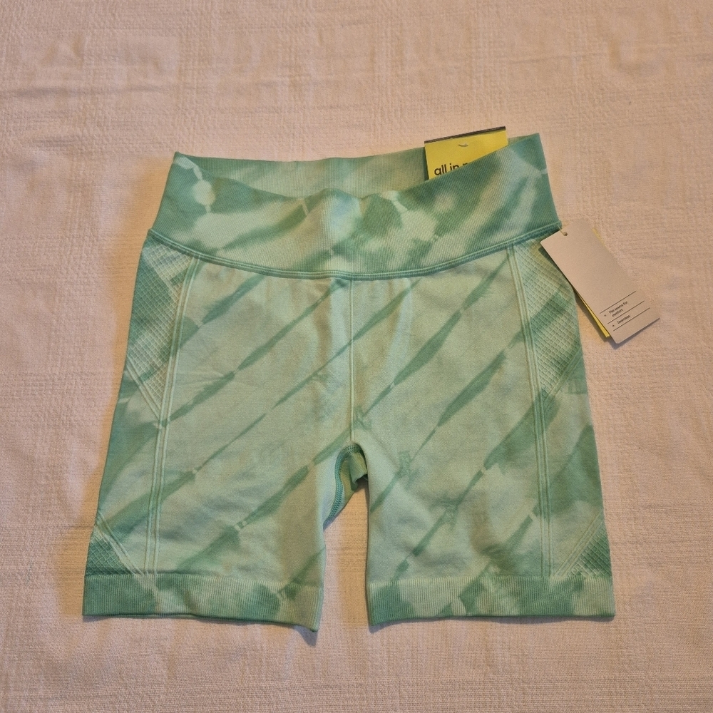 All in motion girls size Large or 10/12 high rise bike shorts multi shade green